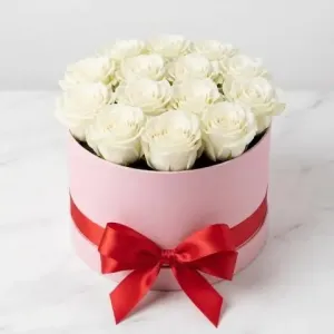 Pure white premium fresh roses artfully arranged in an elegant luxury gift box with satin ribbon by Athens Flower Shop